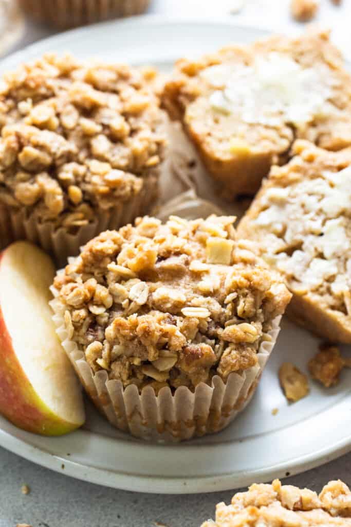apple granola muffins on a white plate.