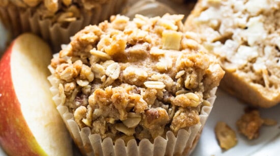 apple granola muffins on a white plate.