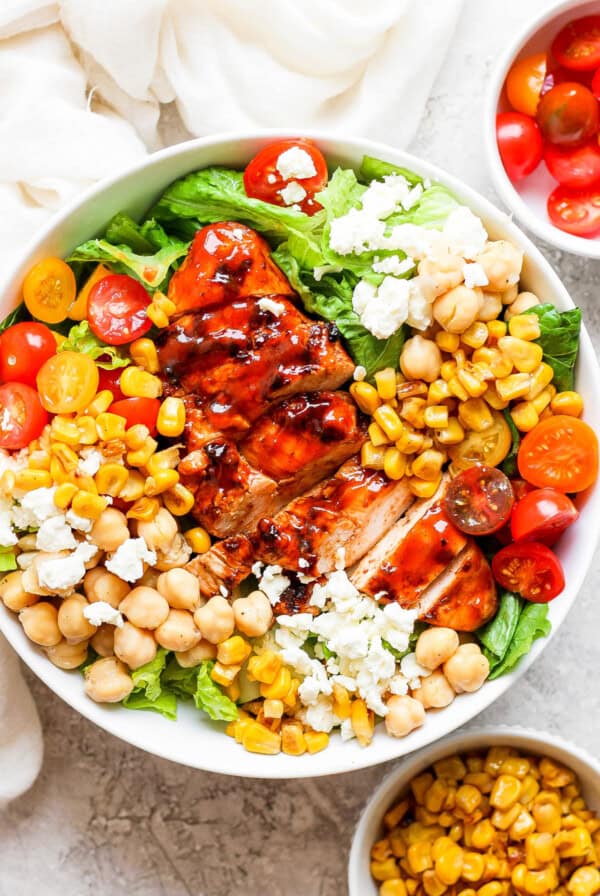 bbq chicken salad with corn and tomatoes.