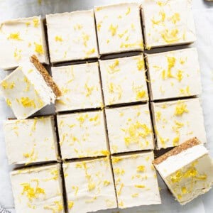 lemon bars with cashew cream and cashew nuts.