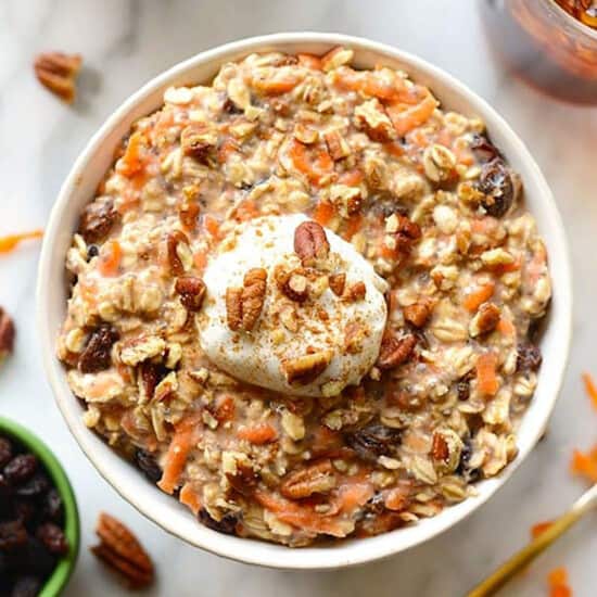 Carrot cake-inspired bowl of oatmeal with whipped cream.