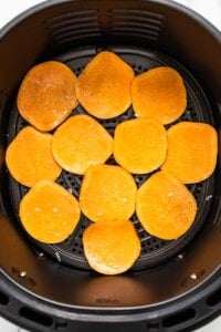 Sweet potato chips in an air fryer.