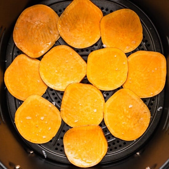 Sweet potato chips in an air fryer.