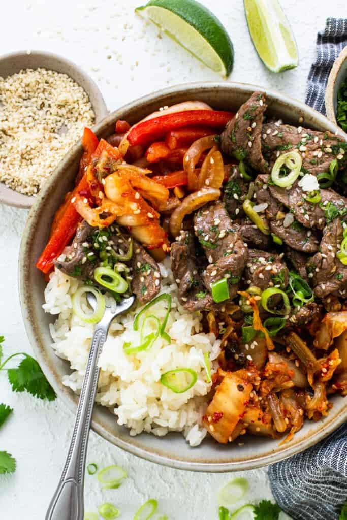 Korean beef bowl with rice and vegetables.