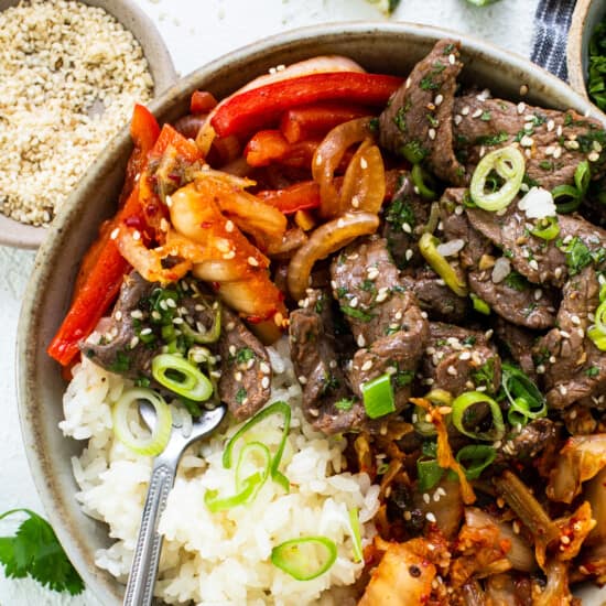 Korean beef bowl with rice and vegetables.