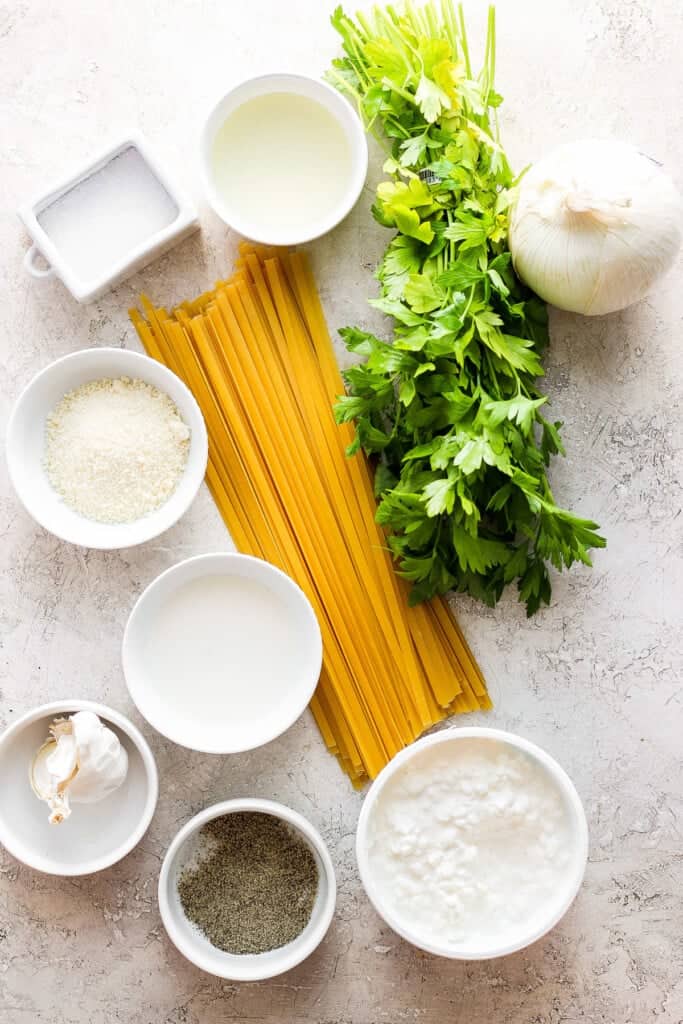 Ingredients for fettuccine with parmesan cheese and garlic.