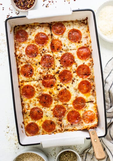 Pepperoni pizza in a baking dish.