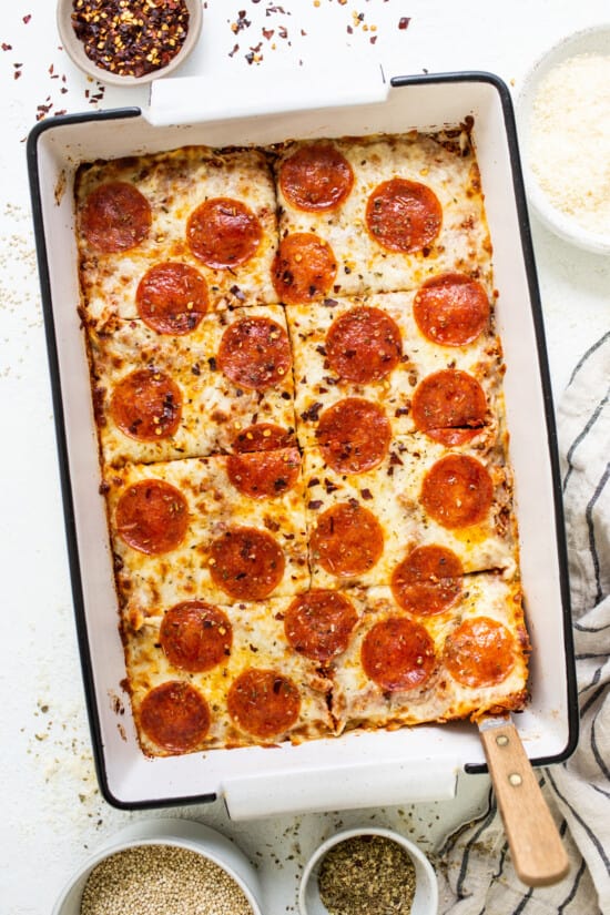 Pepperoni pizza in a baking dish.