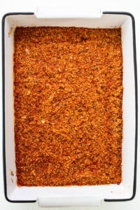 A baking dish filled with a mixture of spices.