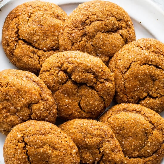 Ginger cookies on a plate with a fork.