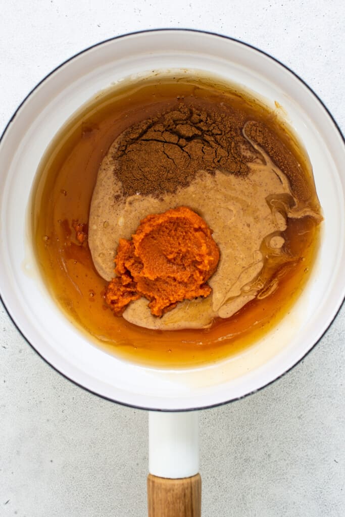 A frying pan filled with a mixture of brown and orange.
