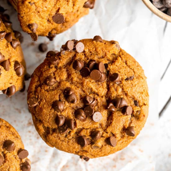 Pumpkin chocolate chip muffins with chocolate chips.