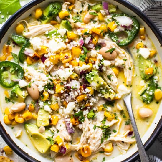 Chicken and corn soup in a bowl.