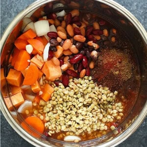 An Instant Pot filled with beans, carrots, and other ingredients makes a delicious chili.