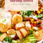 A bowl of shrimp bowls with limes and avocados.