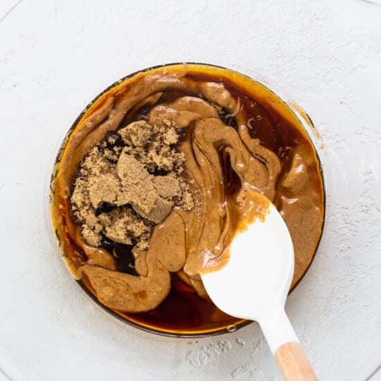 Peanut butter in a bowl with a spoon.