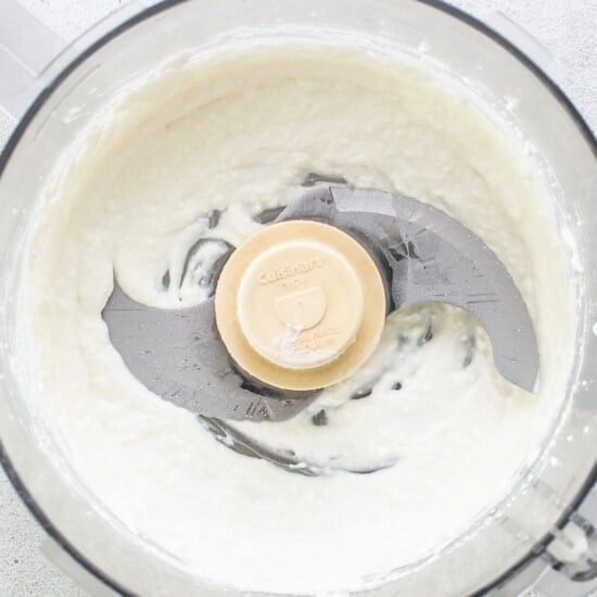 Whipped cream in a food processor.