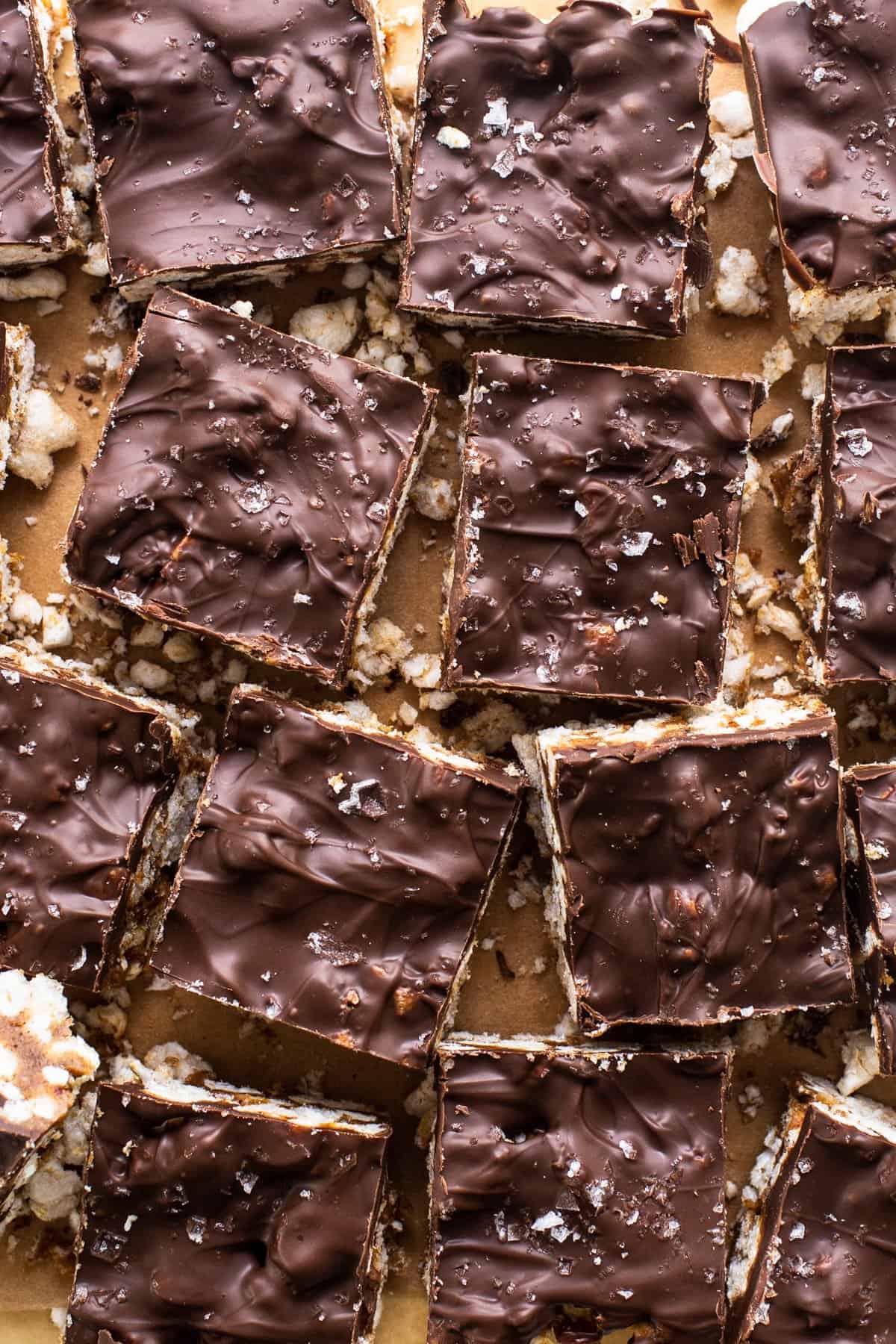 A tray of chocolate covered bars on a table.