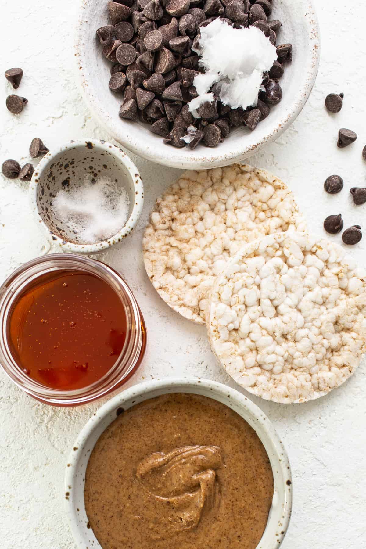 A bowl of peanut butter, chocolate chips, and other ingredients.