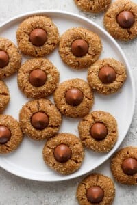 Easter egg cookies on a white plate.