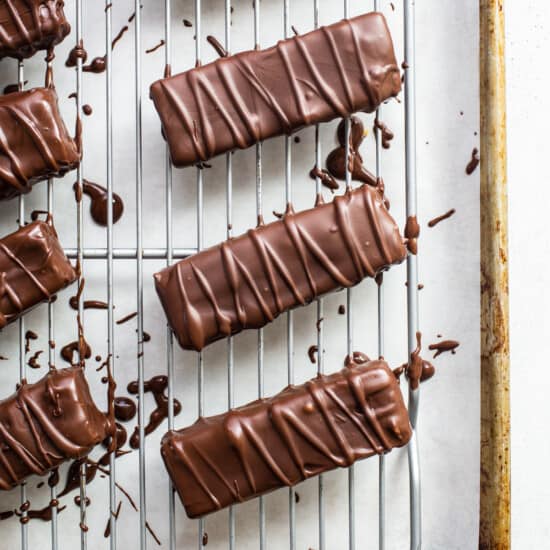 Chocolate bars on a cooling rack.