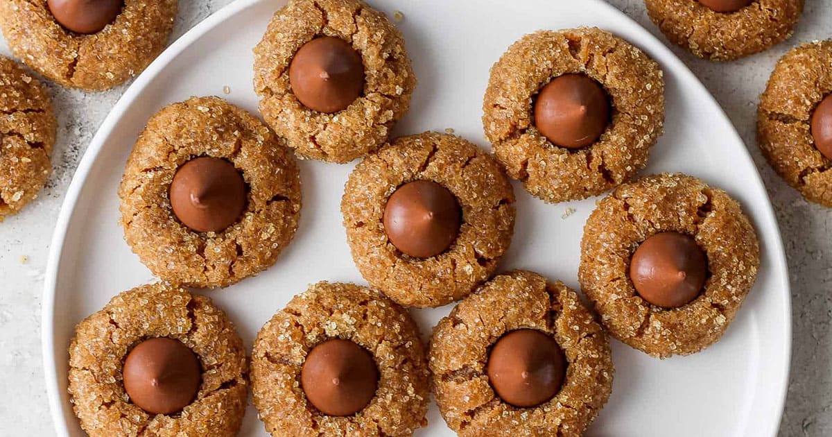 https://fitfoodiefinds.com/wp-content/uploads/2023/12/Flourless-Peanut-Butter-Blossoms-03.jpg