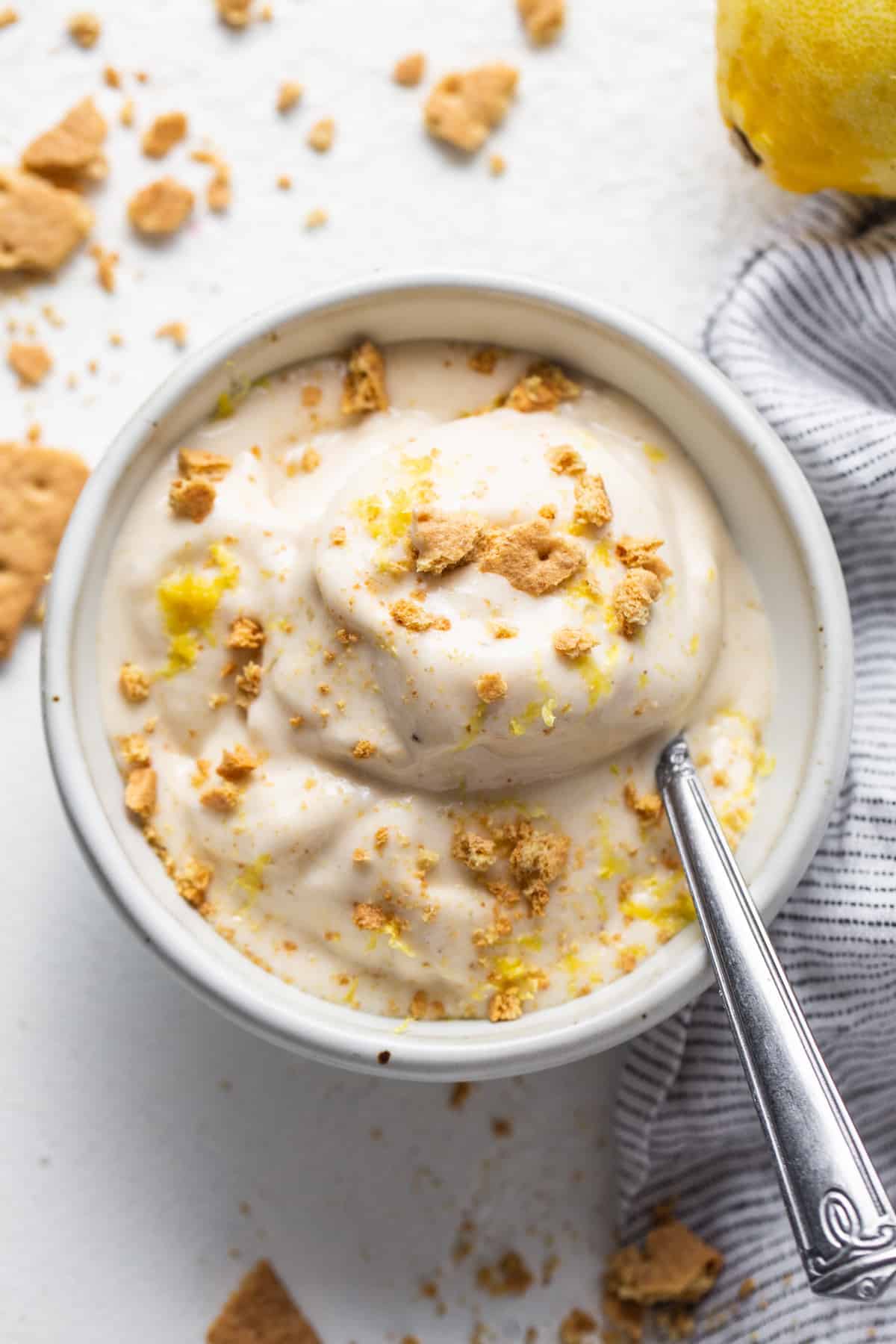 A bowl of food with a spoon.