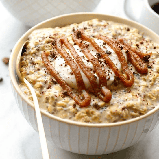 Coffee-infused Overnight Oats with a drizzle of caramel sauce.