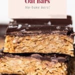 A stack of oat bars with the text pb cup oat bars no take bars.