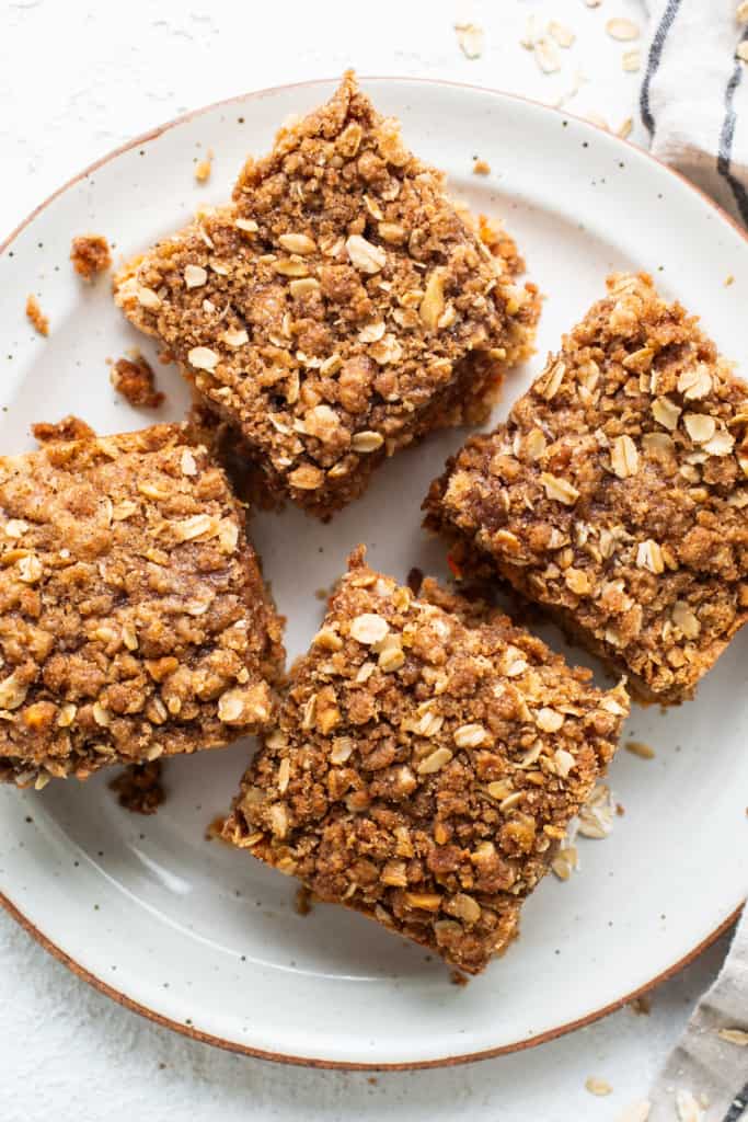 Oat bars on a plate with a napkin.