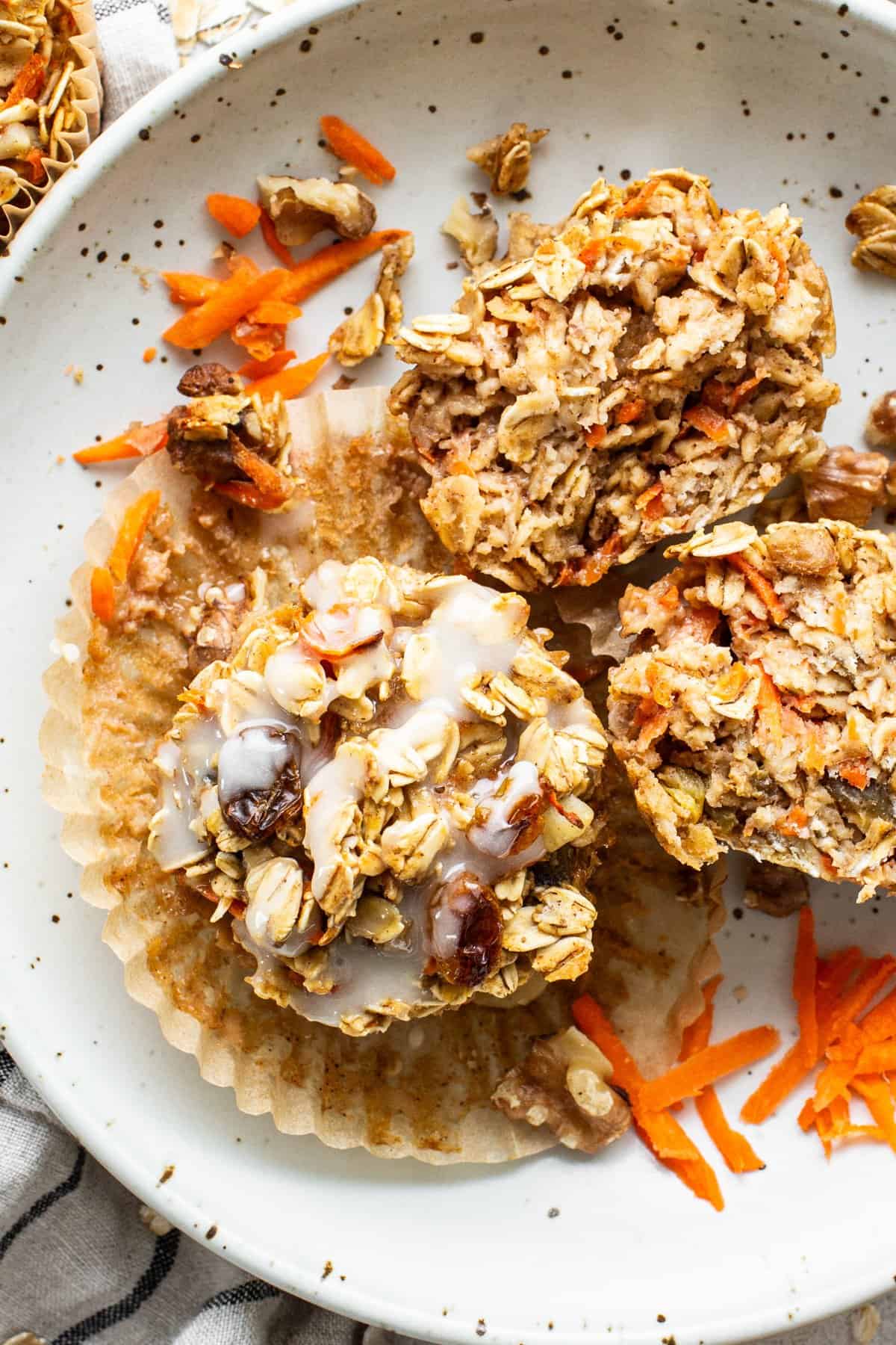 A plate with granola muffins on it.