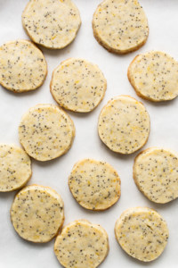 Lemon poppy seed cookies on a baking sheet.