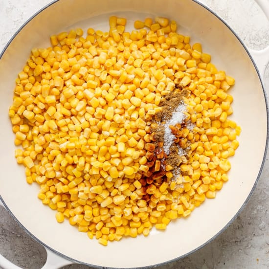 Corn on the cob in a white pan.