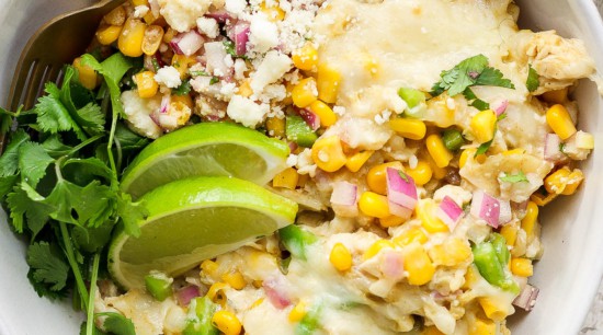 Mexican corn and chicken casserole in a white bowl.