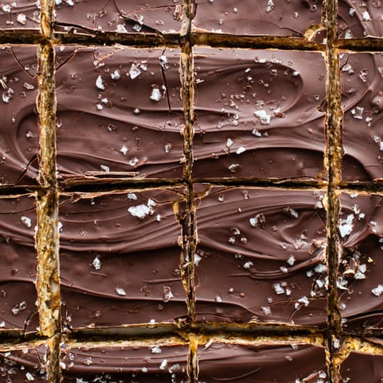 A close up of chocolate bars with sprinkles on them.