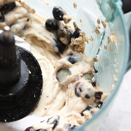 Blueberries and batter mixed together in a food processor for a Blueberry Muffin base.
