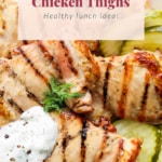 Grilled chicken thighs served with dill pickles and a creamy sauce, suggested as a healthy lunch option.