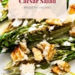 Grilled caesar salad with croutons and dressing.