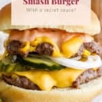 Double patty burger with cheese, corn, and pickles on a bun highlighted as "street corn smash burger with a secret sauce!.