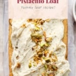 A vanilla pistachio loaf with frosting and chopped pistachios on top, presented with a label that reads "vanilla pistachio loaf - yummy loaf recipe!.