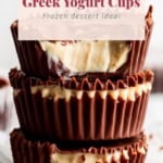 Stack of frozen greek yogurt cups with chocolate coating and peanut butter drizzle, labeled as "protein greek yogurt cups.